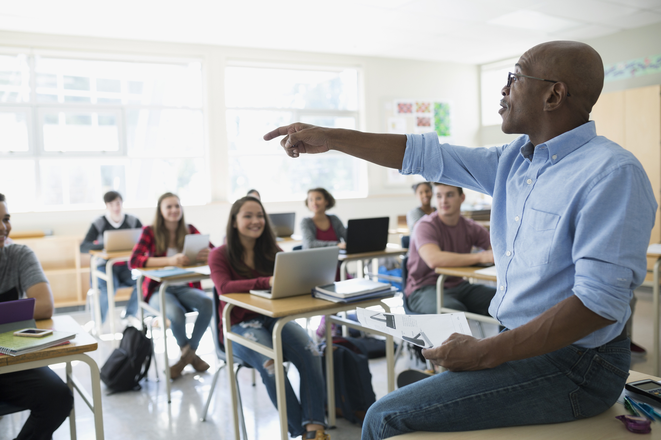 Teacher engaging with students in classroom