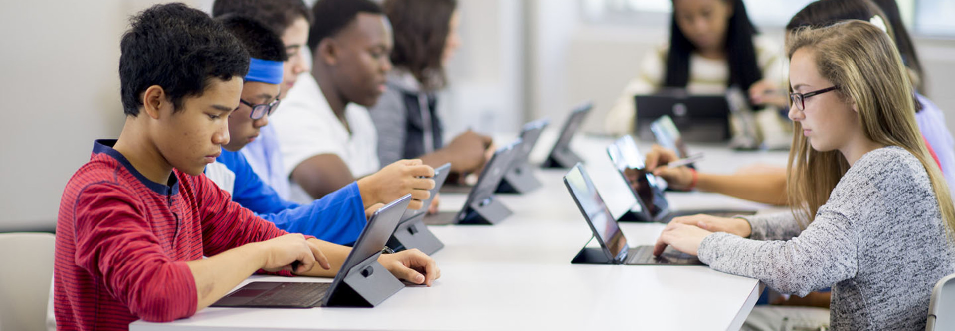 Students using tablets for digital learning